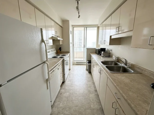 Before: builder-grade condo galley in Harbourfront